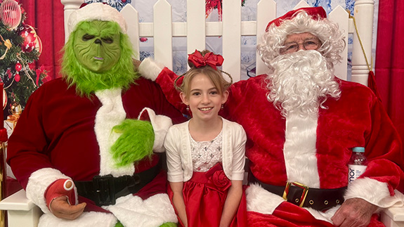 The Grinch joins Ruby’s Kids for cancer center holiday party